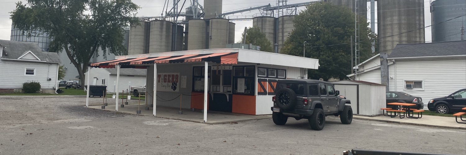 The Tiger Den Dairy Bar banner