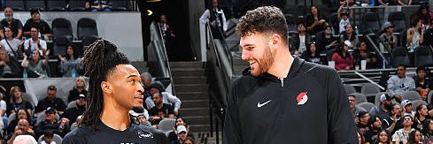 Huskies in the Pros banner