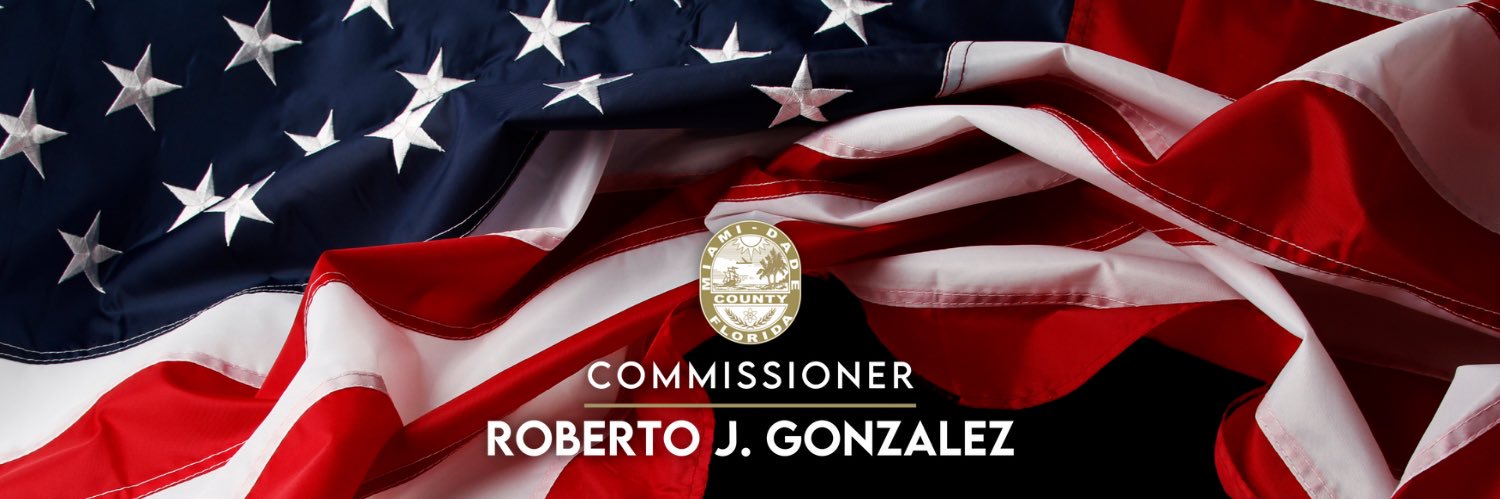 Commissioner Roberto J. Gonzalez's banner
