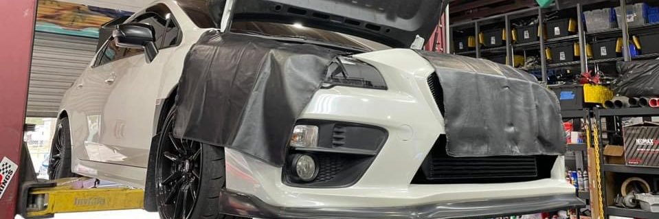 Some guy with an STI⚡️ banner