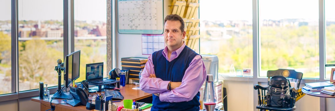 George Assimakopoulos banner