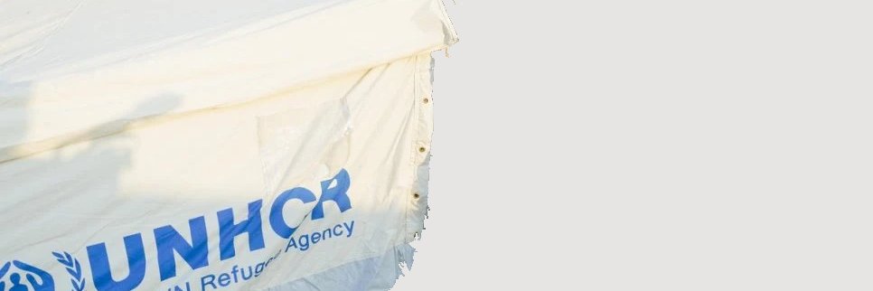 In The Camp banner