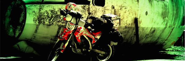 OneWomanOneMoto Profile Banner