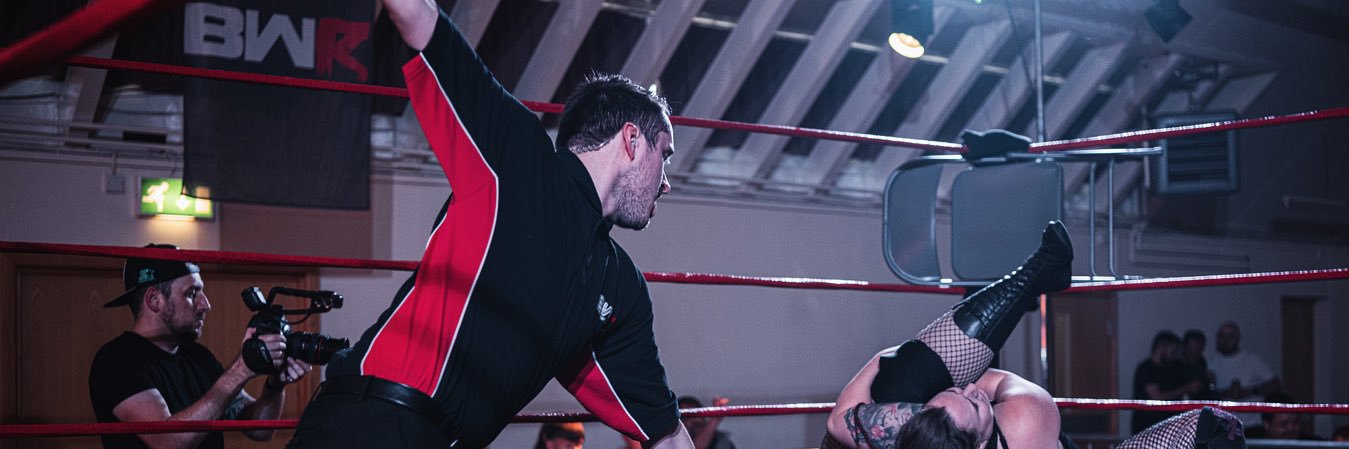 Referee Ross Cowling banner