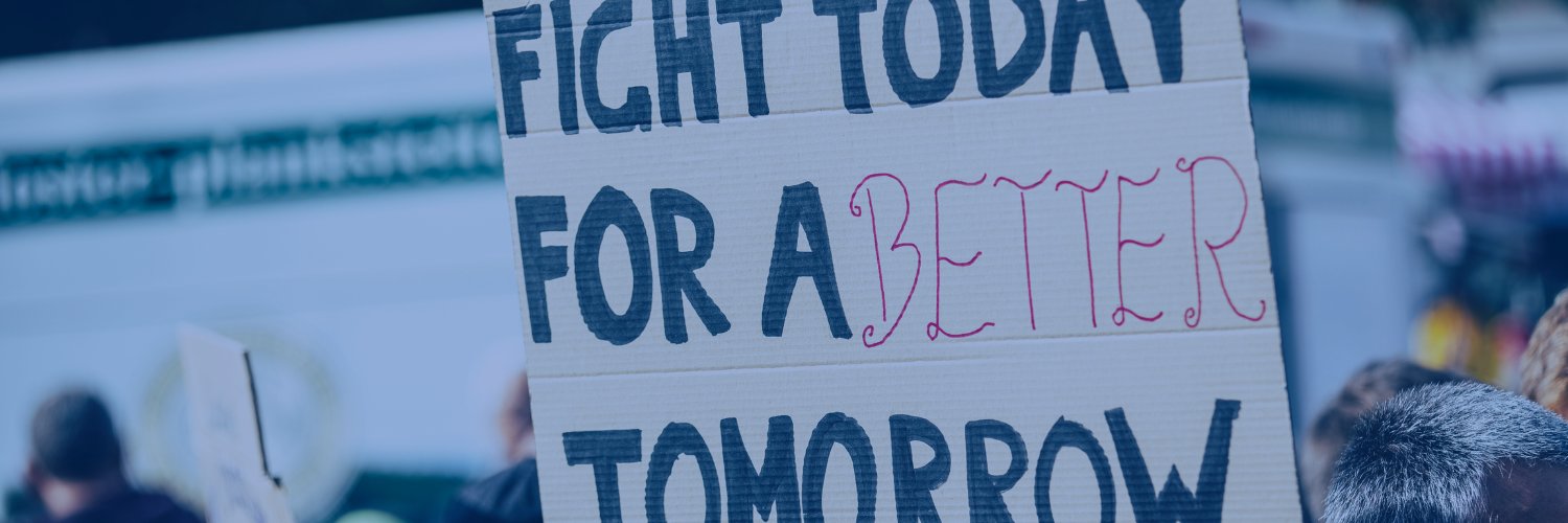 Essential Workers for Democracy's banner