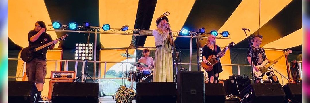 Between Thorns banner