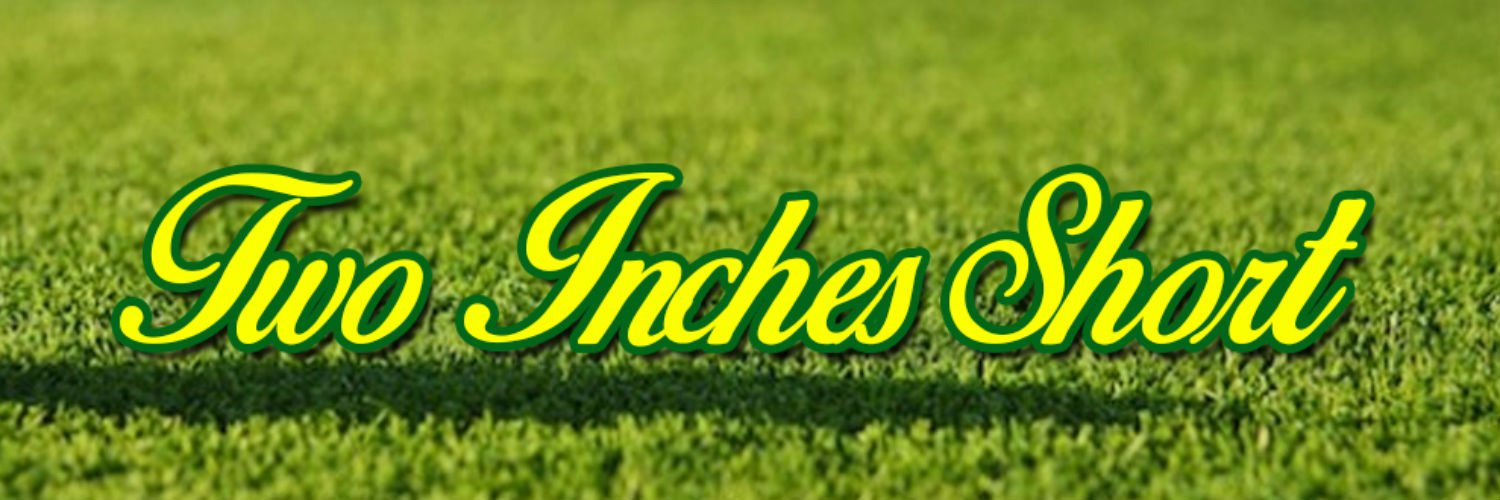 Two Inches Short banner