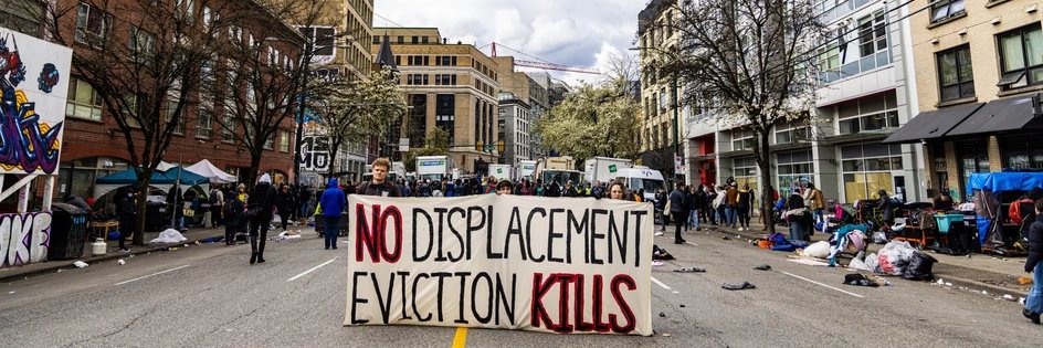 Stop the Sweeps Vancouver's banner