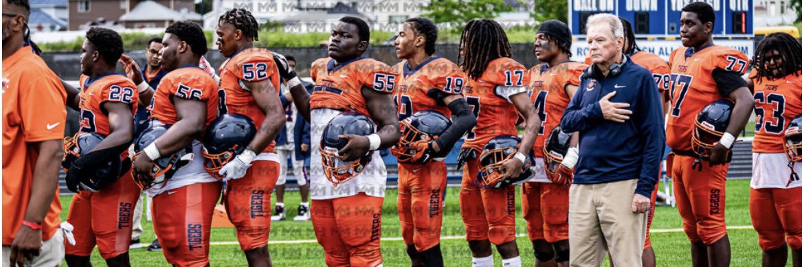 Amos “BRUCE” Lutete banner