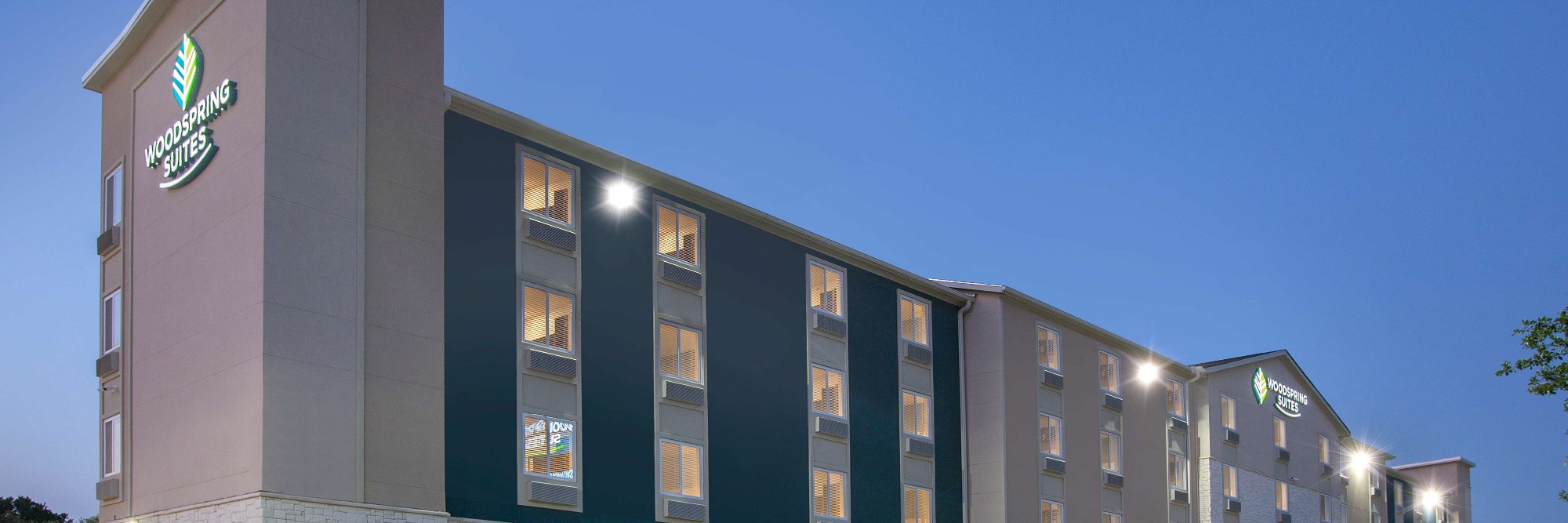 WoodSpring Suites banner