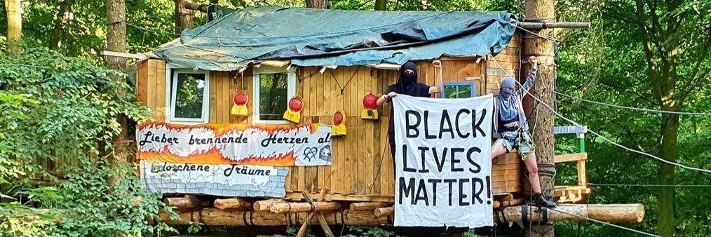 Ecocide = Genocide! banner