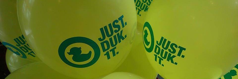 JUST DUK1T banner