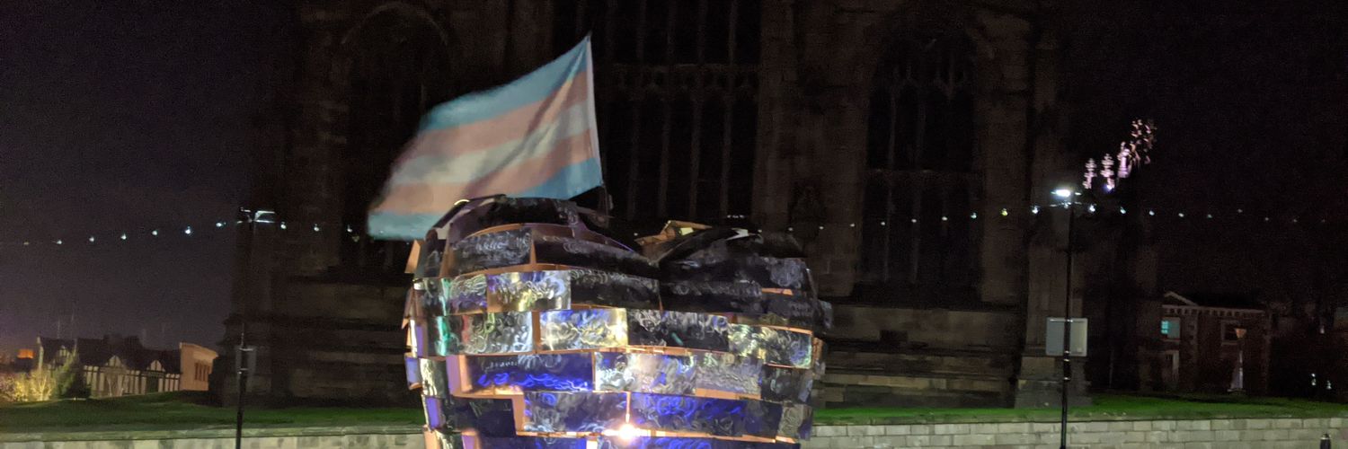 Em Wraw (she/her) banner