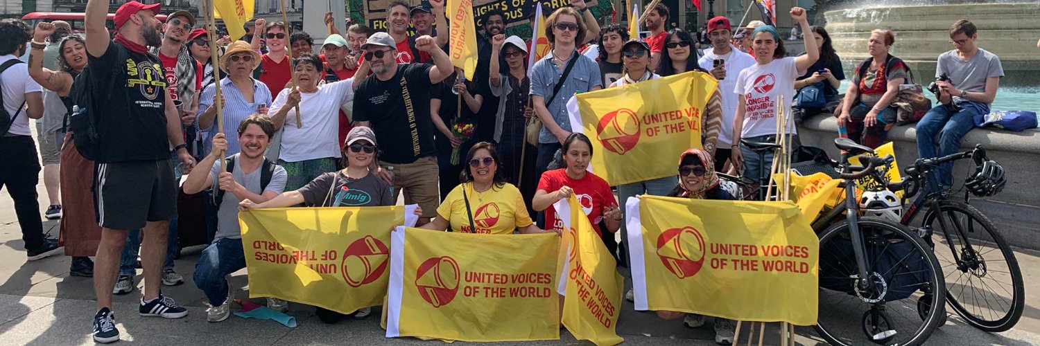 United Voices of the World's banner