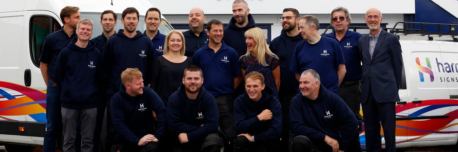 Harrisons Signs banner
