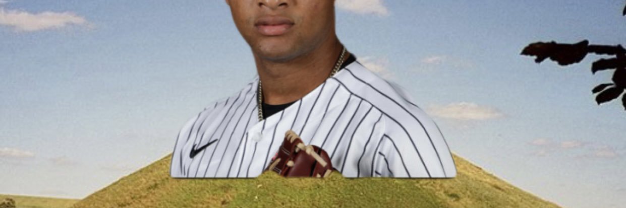 Luis Gil on a Hill's banner