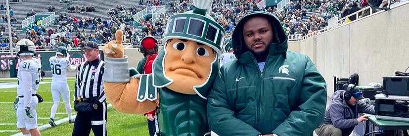 Tom “March” Izzo banner