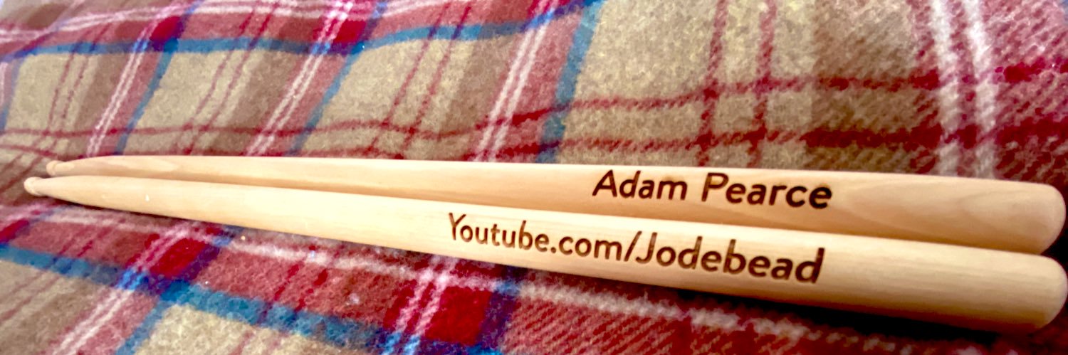 Adam Pearce banner