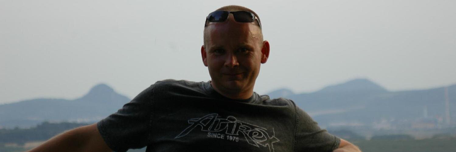 Mirek Komárek banner