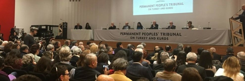 Rojava Peoples' Tribunal banner