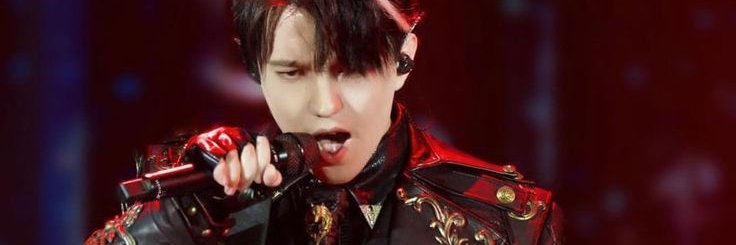 M. Emi - ► DQ♩ banner