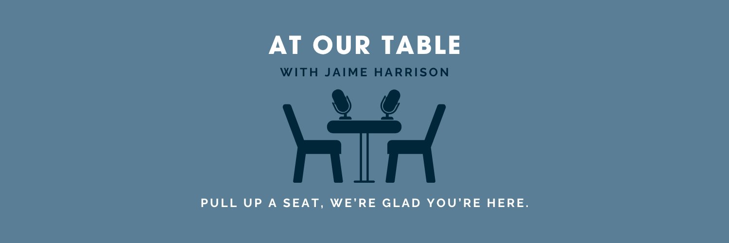 At Our Table's banner