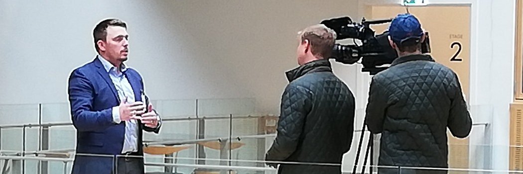 Christian L. Straszek banner