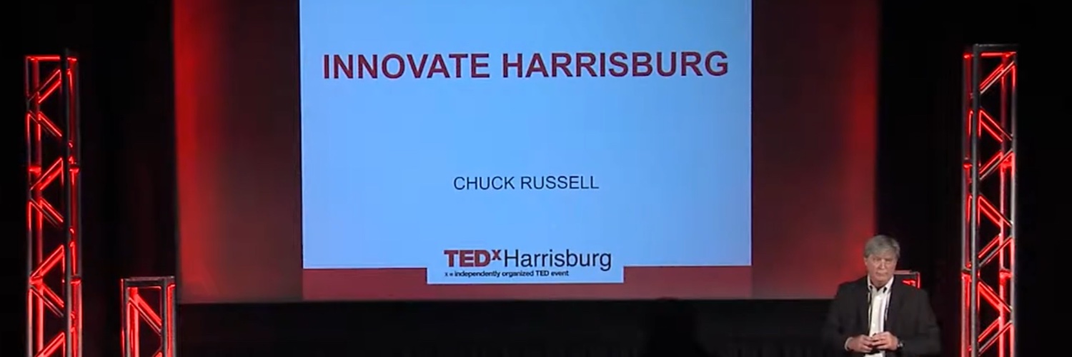 Chuck Russell banner