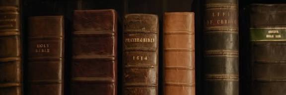 With The Saints banner