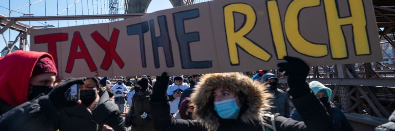 Tax The Rich banner