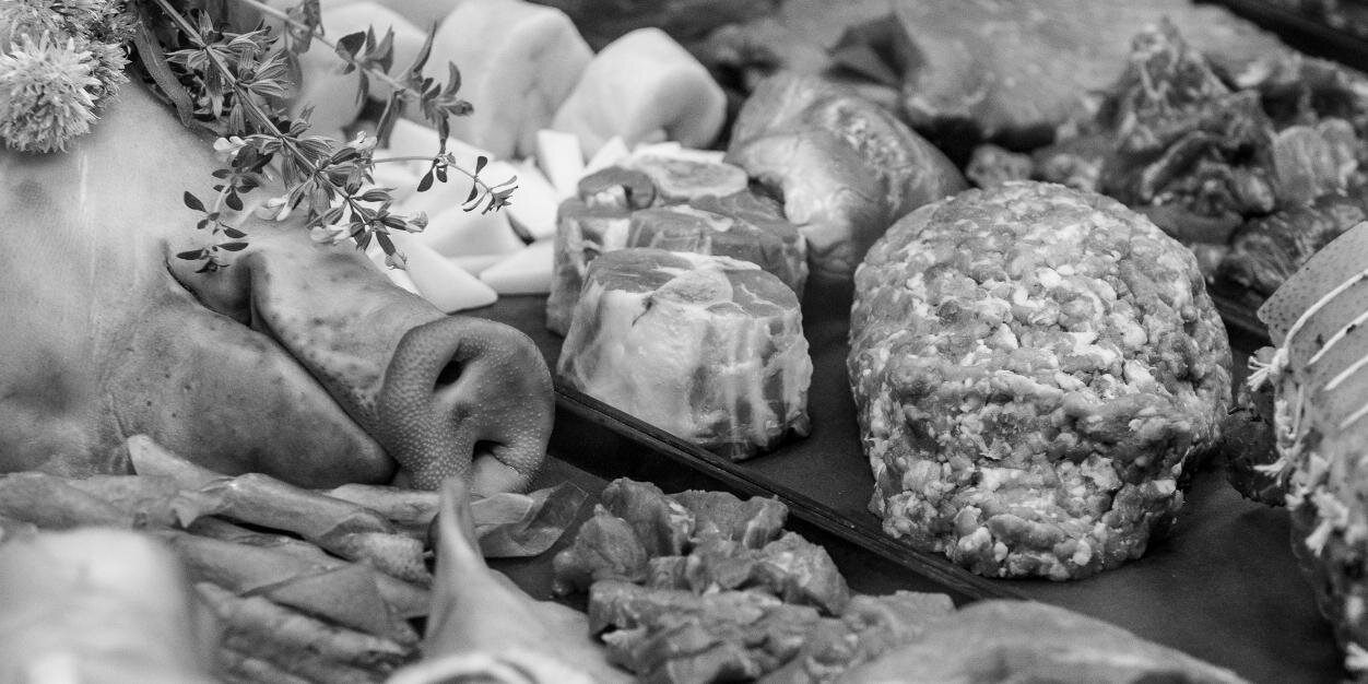 M.F. Dulock Meats banner