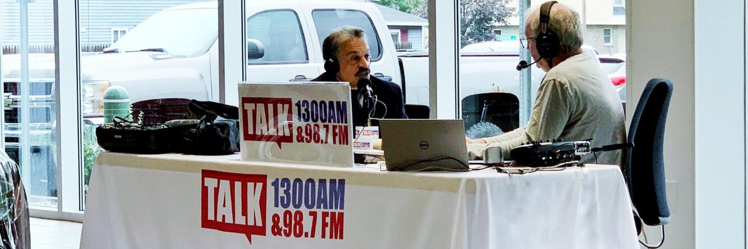 TALK1300/98.7 banner