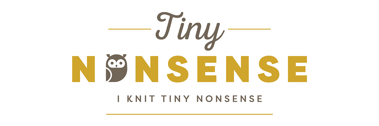 Hunter knits tiny nonsense banner