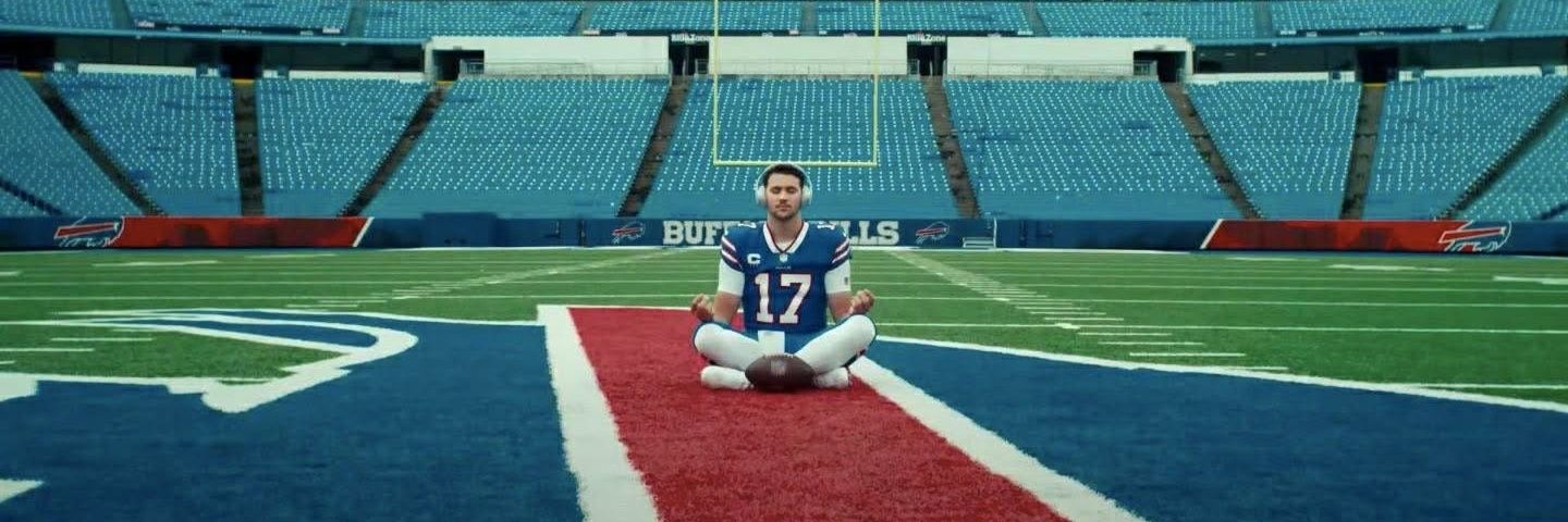 Jason Casey is yelling GO BILLS banner