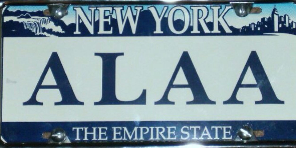 T Alaa banner