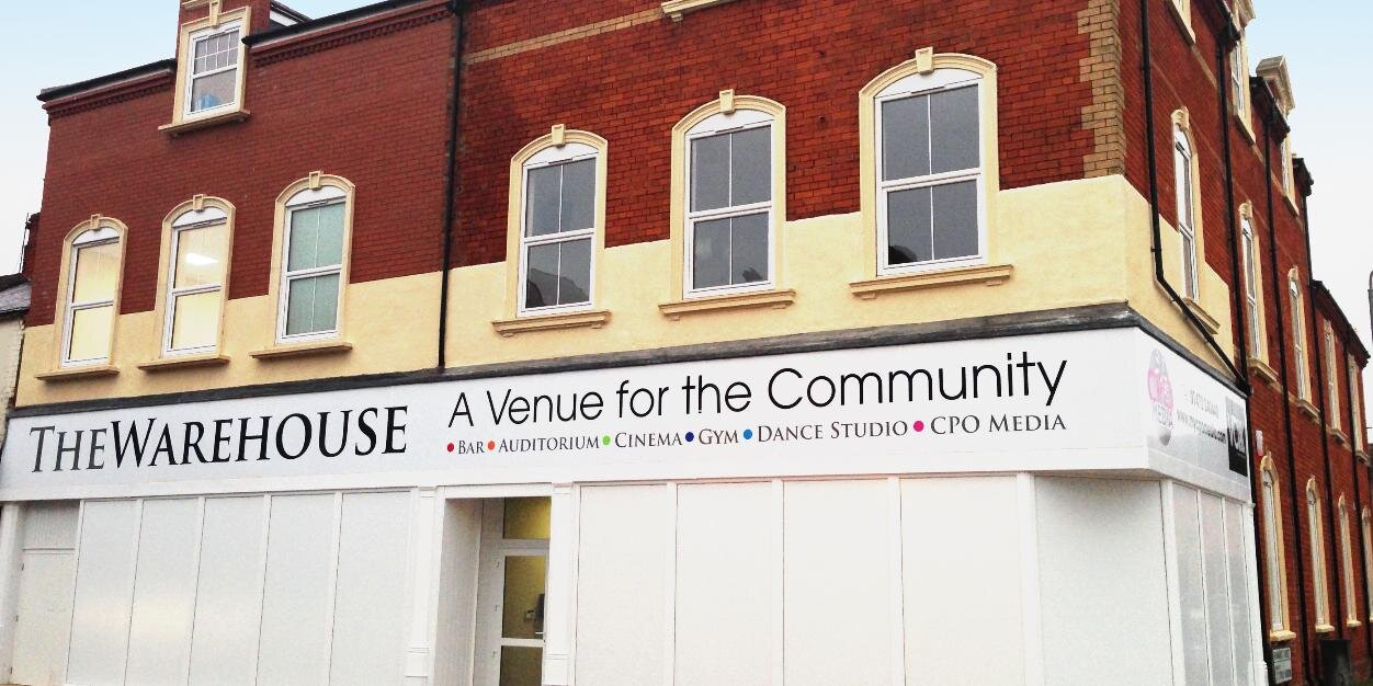 The Warehouse banner