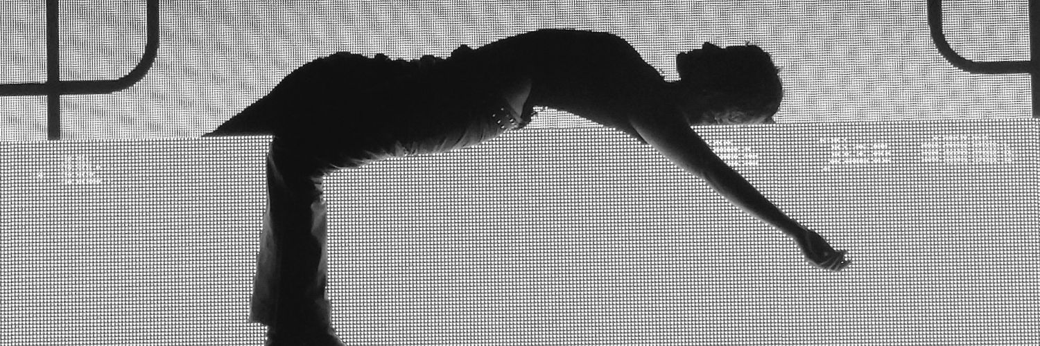 Tom E. banner