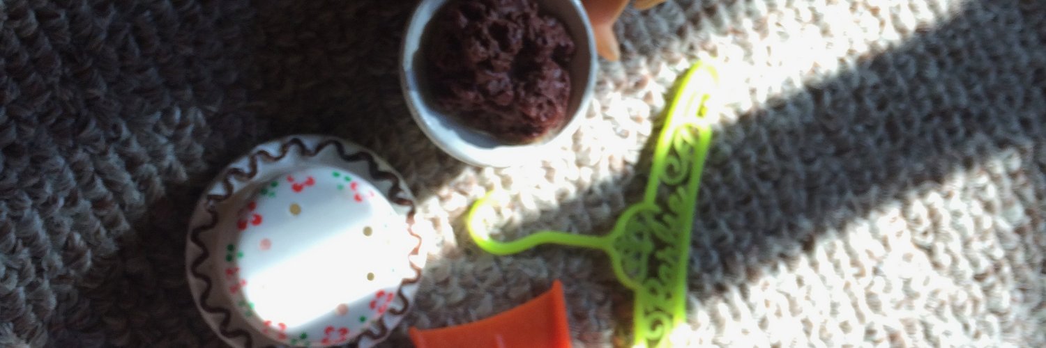 has fine Norman porch with Zodiac signs banner