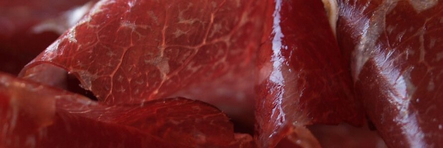 Comer de León banner