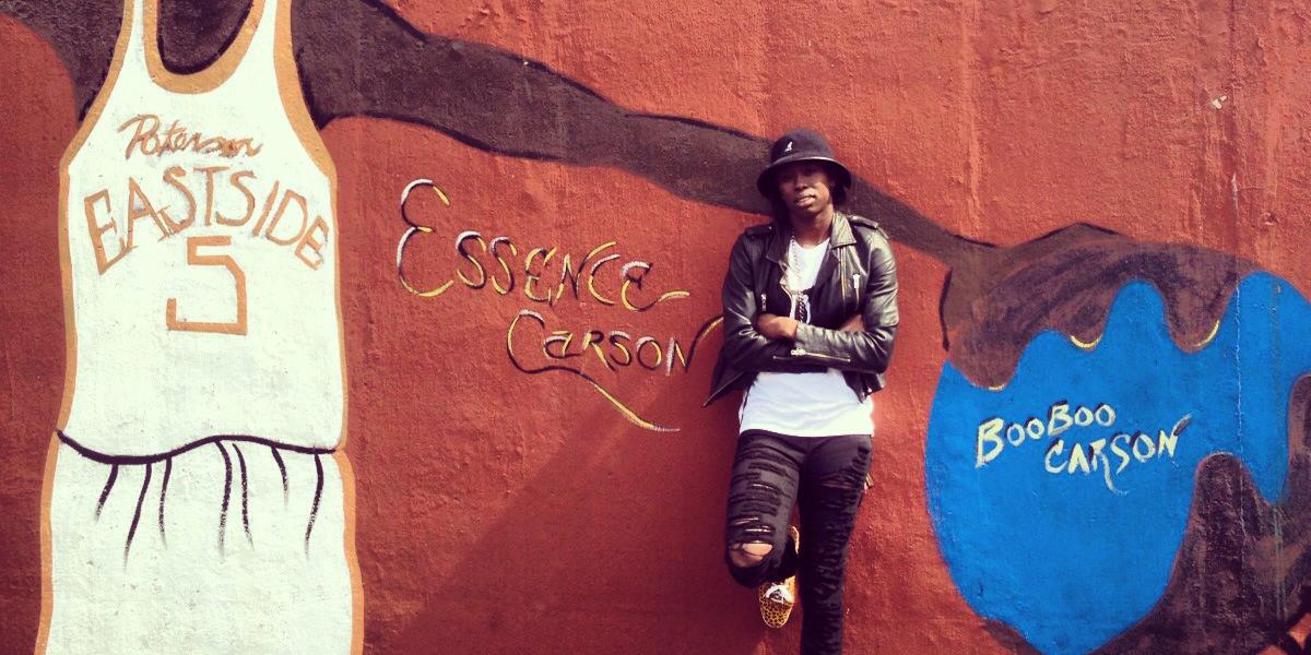 Essence T. Carson banner