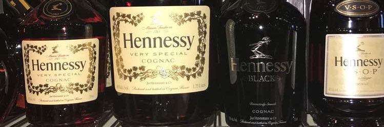 IN HENNY WE TRUST banner