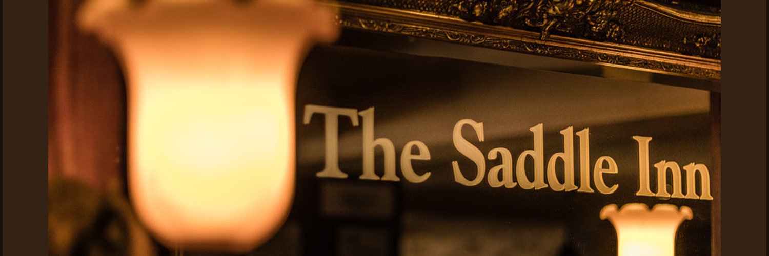 The Saddle Inn banner