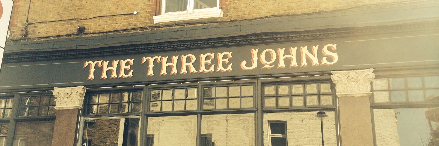 The Three Johns banner