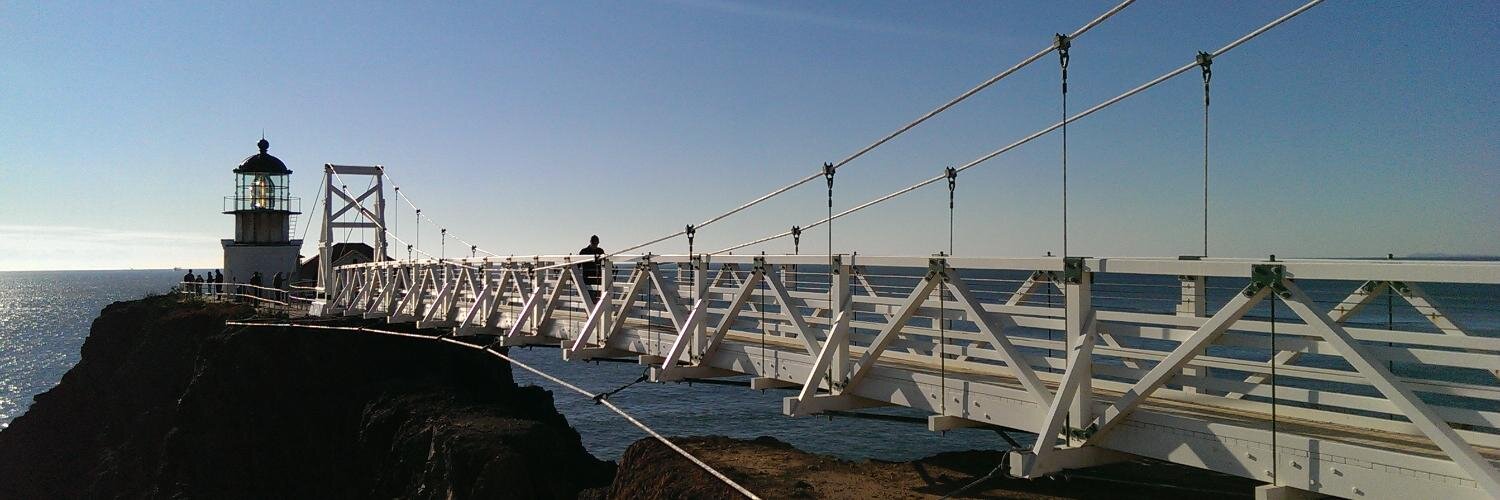 Dennis R. Jlussi banner