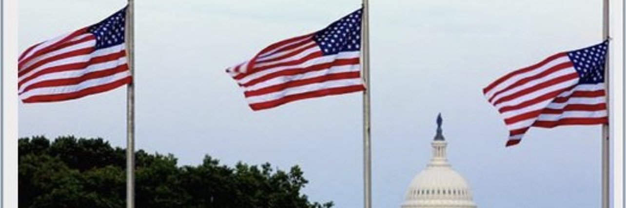 Nicholas Moukazis banner