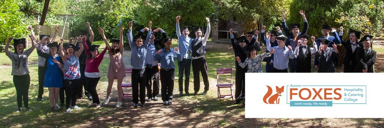 Students from Aurora Foxes banner