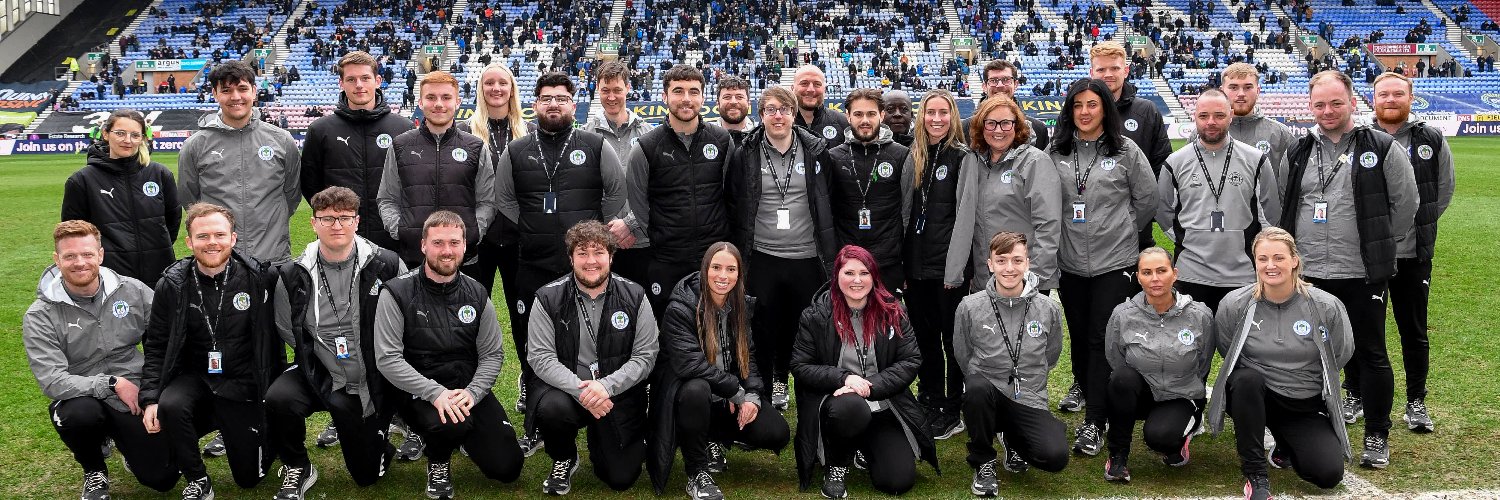 Wigan Athletic Community Trust's banner