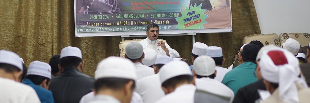 محمد عوض المنقوش banner