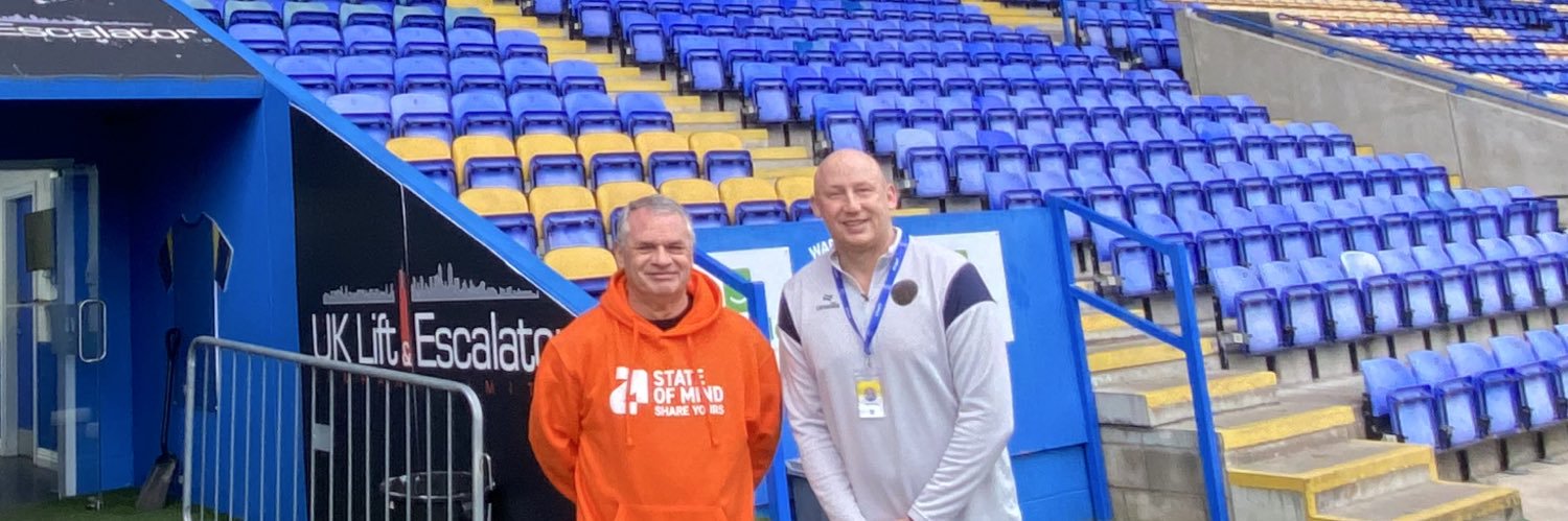 Dr. Phil Cooper MBE banner