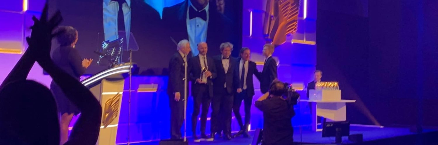 Adam Wells 💙 banner